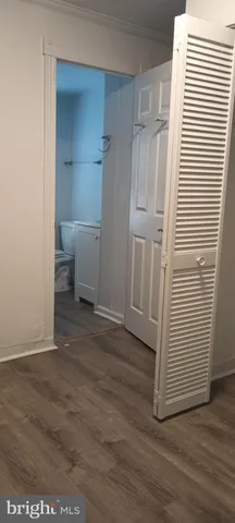 a view of a room that has a bench in it