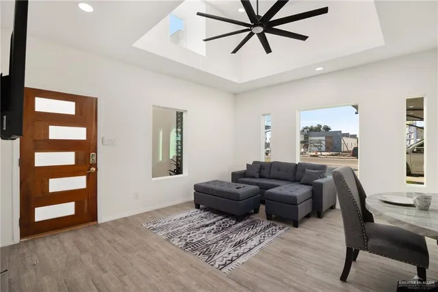 a living room with furniture and window
