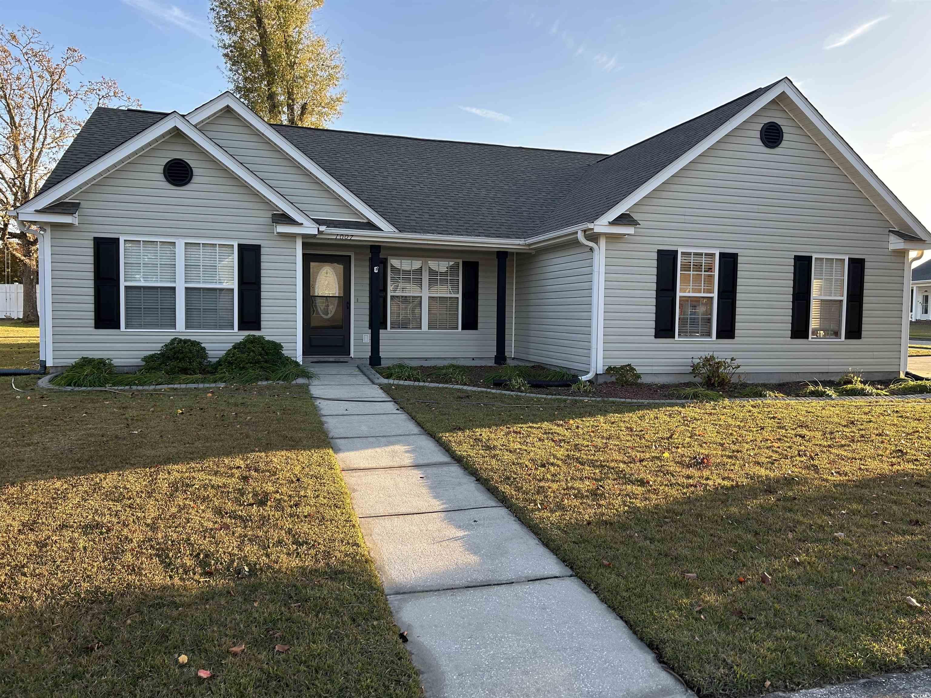 1007 Green Fir Loop Conway, SC 29527 - Photo 1 of 38 Single story home with a front lawn and a shingled roof