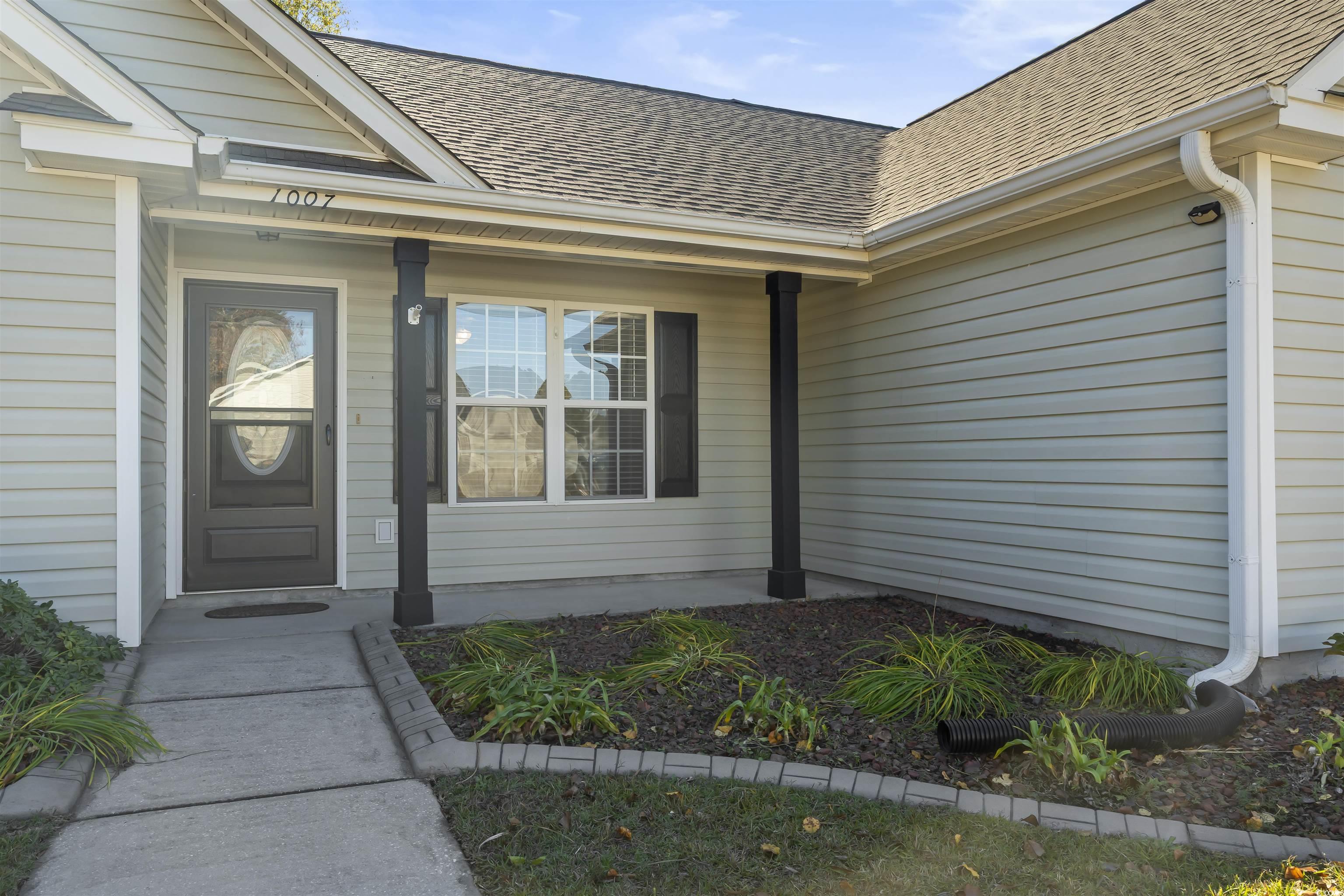 1007 Green Fir Loop Conway, SC 29527 - Photo 2 of 38 Property entrance with a shingled roof