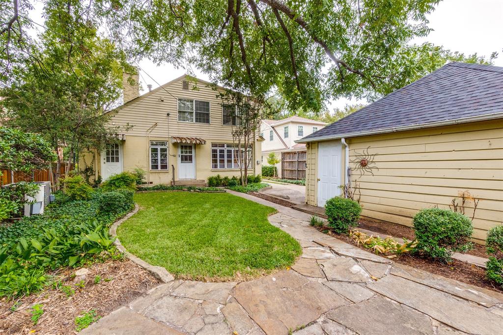 5910 McCommas Boulevard Dallas, TX 75206 - Photo 21 of 22 a front view of a house with a yard