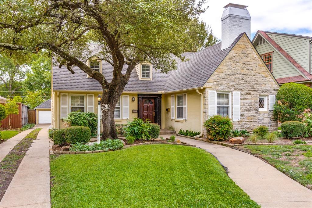 5910 McCommas Boulevard Dallas, TX 75206 - Photo 3 of 22 a front view of a house with a yard and potted plants
