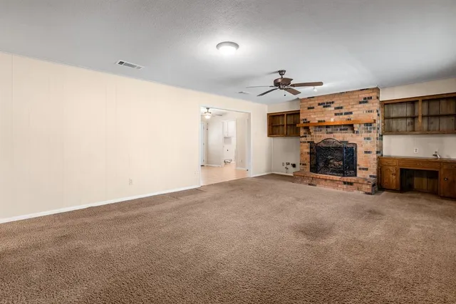a view of a livingroom with a fireplace