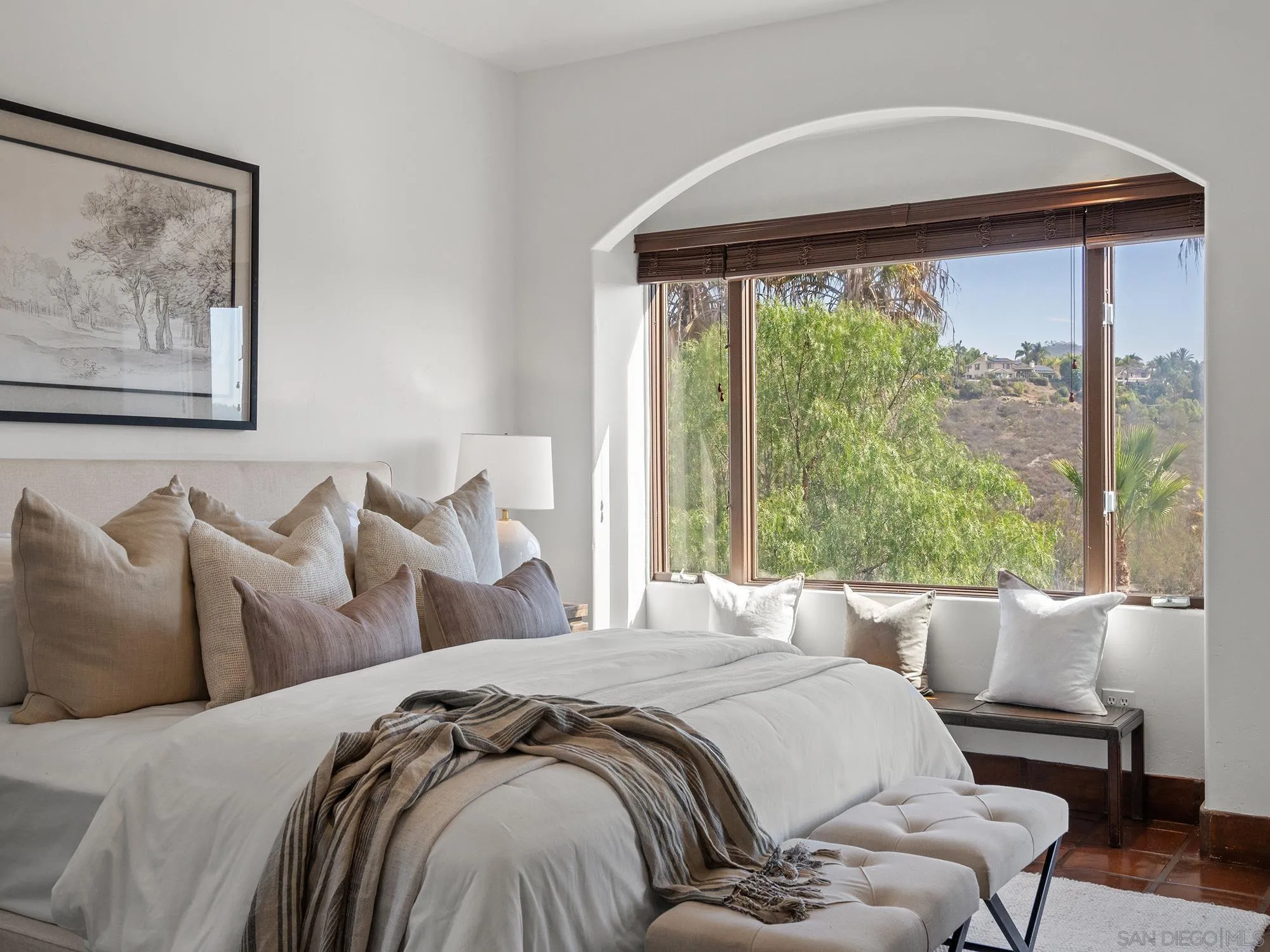 3485 Lone Jack Road Encinitas, CA 92024 - Photo 11 of 27 a bed sitting in a bedroom next to a window