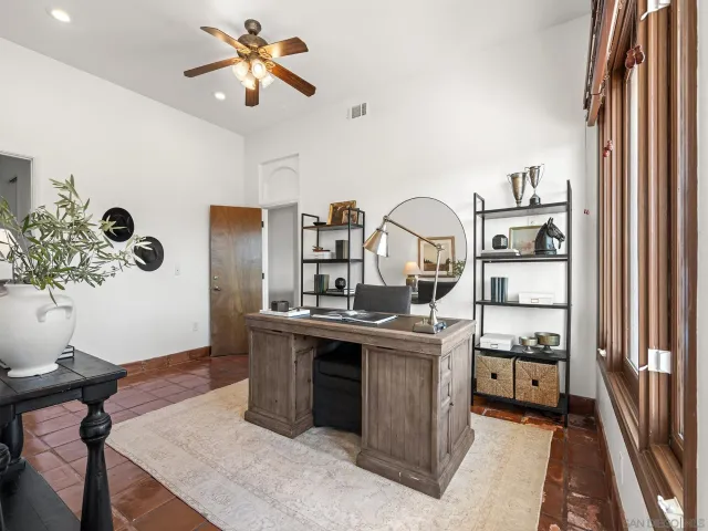 a view of a kitchen with a sink stainless steel appliances and cabinets