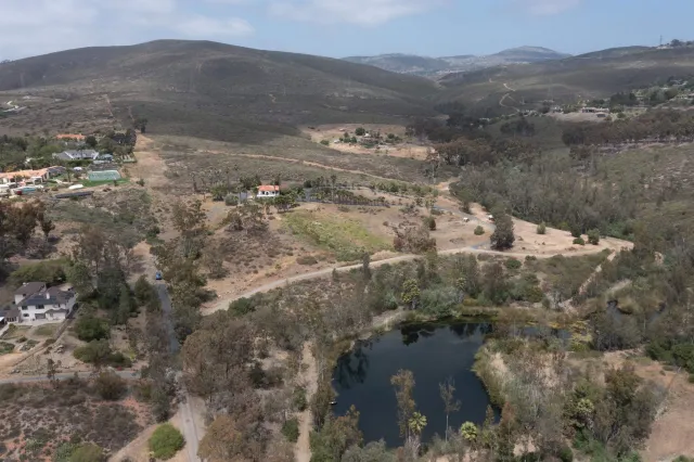 an aerial view of residential house with outdoor space