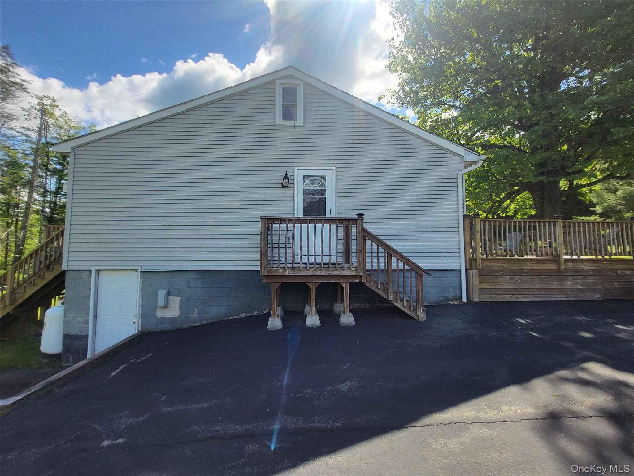 286 Dingle Daisy Road Monticello, NY 12701 - Photo 33 of 35 a view of a house with a yard