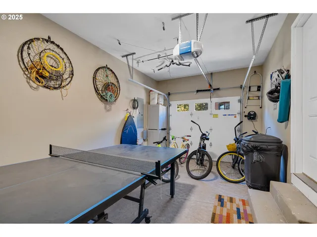 a front view of a house with a garden and yard