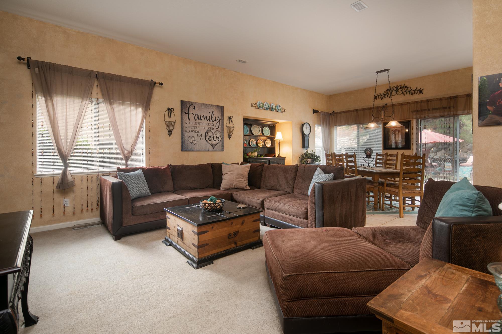 1981 Moon Shadow Drive Reno, NV 89523 - Photo 9 of 26 a living room with furniture and a large window