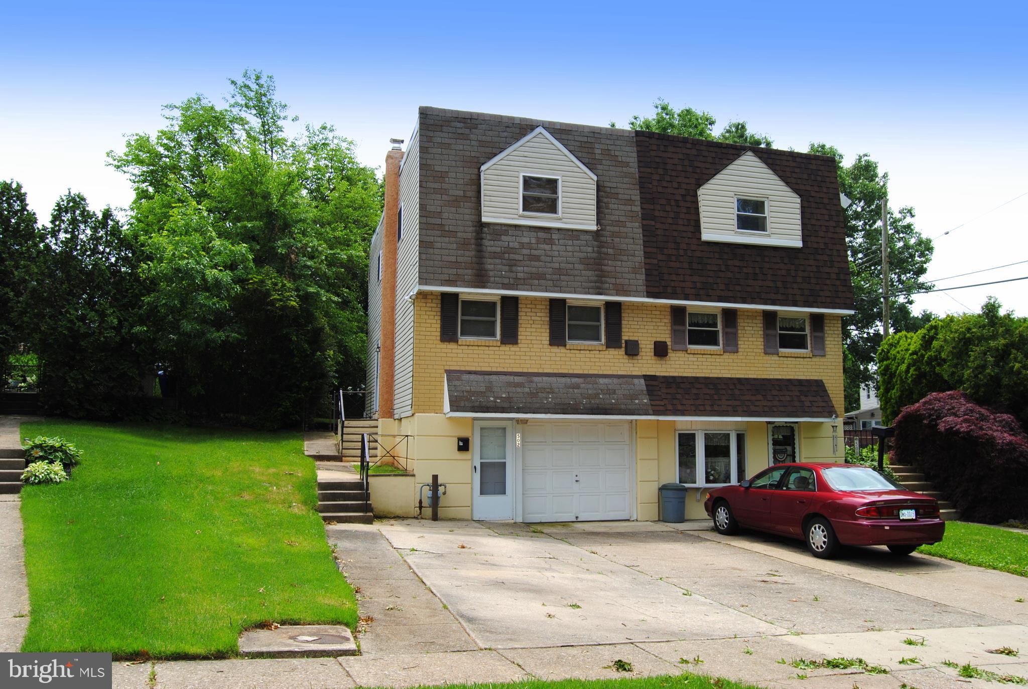 502 Norma Lane Norristown, PA 19401 - Photo 1 of 24 a front view of a house with a garden