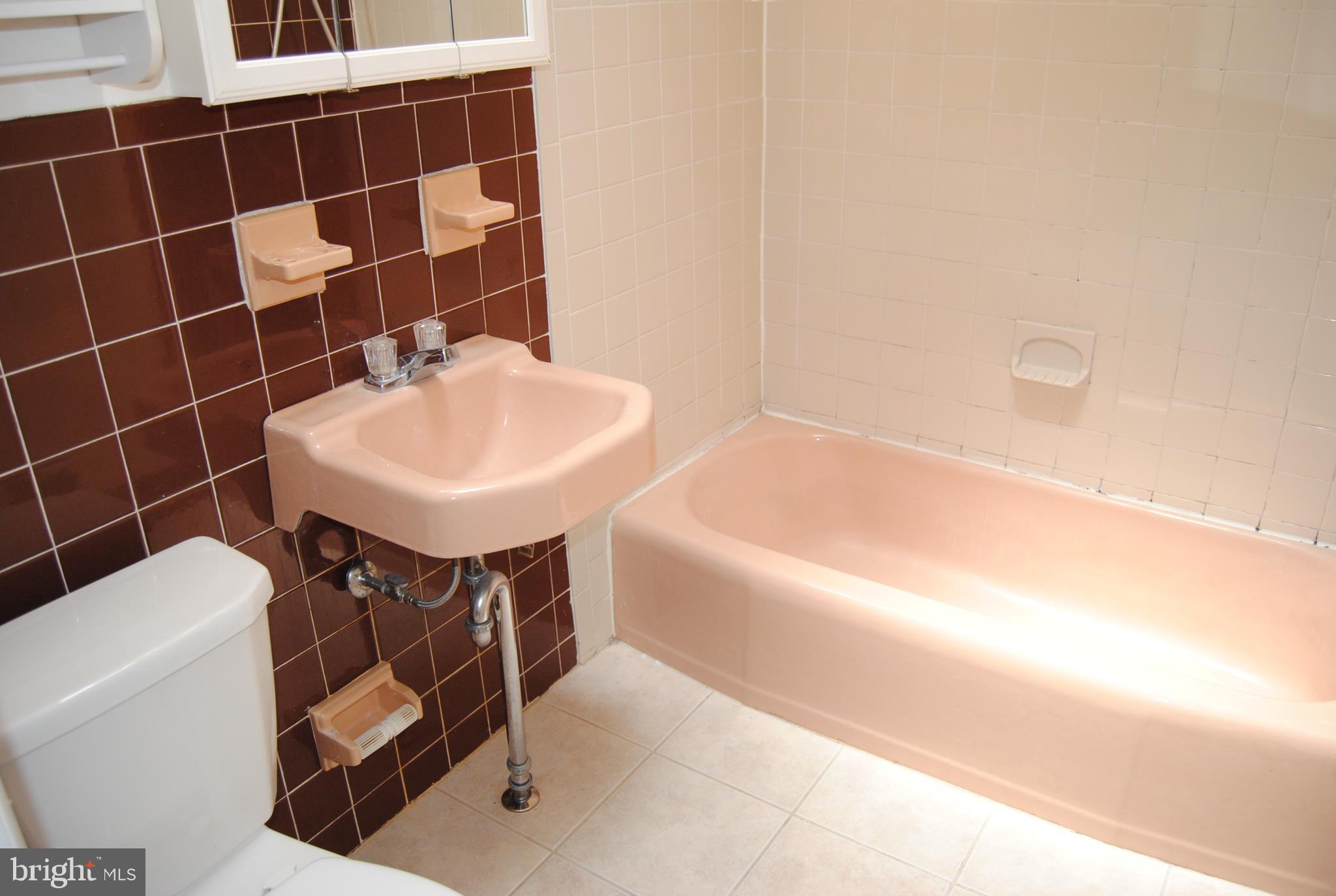 502 Norma Lane Norristown, PA 19401 - Photo 17 of 24 a bathroom with a sink toilet and shower