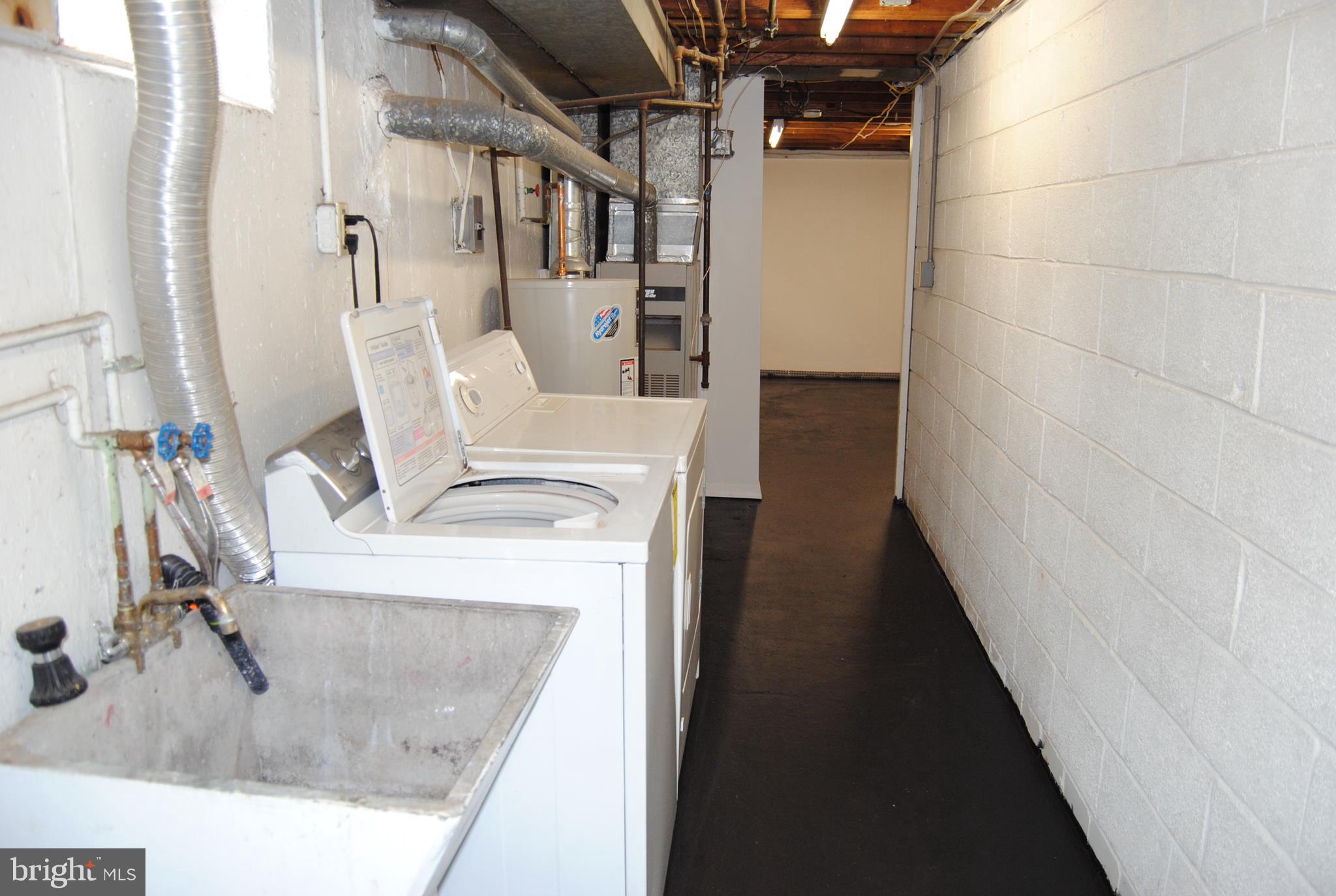 502 Norma Lane Norristown, PA 19401 - Photo 19 of 24 a bathroom with a sink and mirror