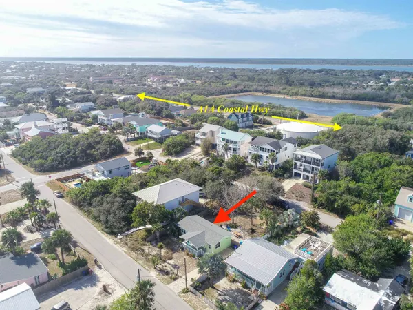 a view of outdoor space with signage and flags