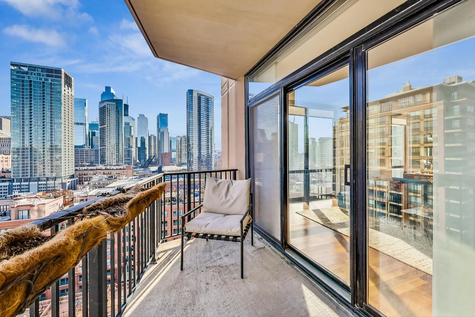 435 West Erie Street, Unit 1501 Chicago, IL 60654 - Photo 19 of 26 a view of a city from a balcony