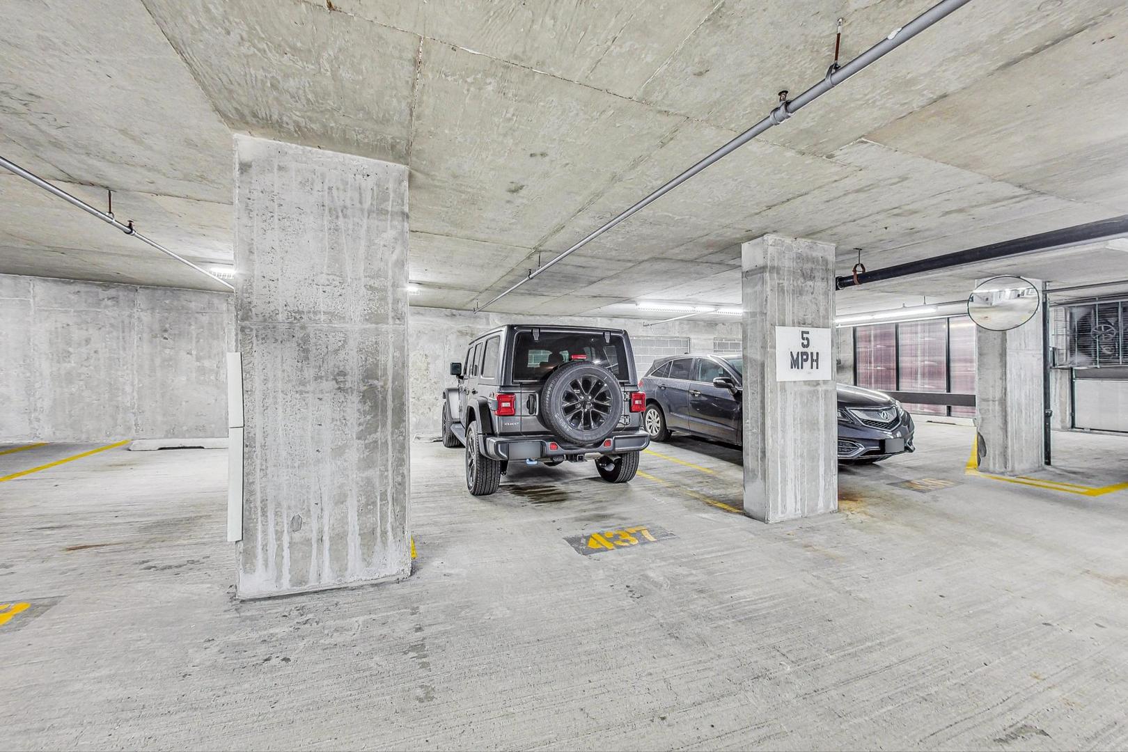 435 West Erie Street, Unit 1501 Chicago, IL 60654 - Photo 25 of 26 a view of parking garage with cars
