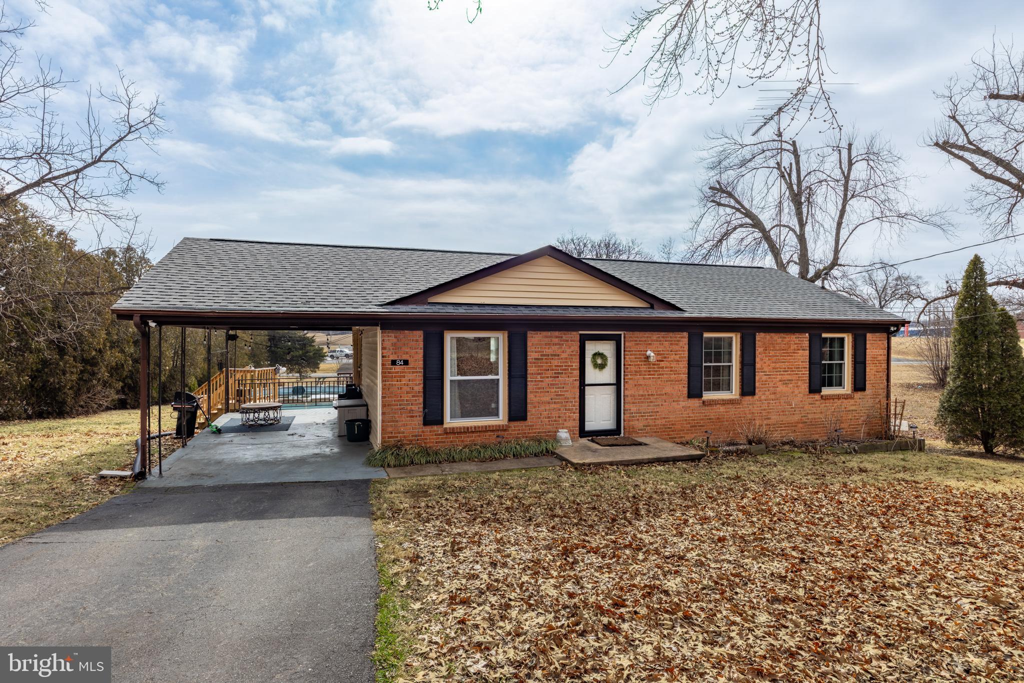84 Clore Road Madison, VA 22727 - Photo 1 of 28 a front view of a house with garden