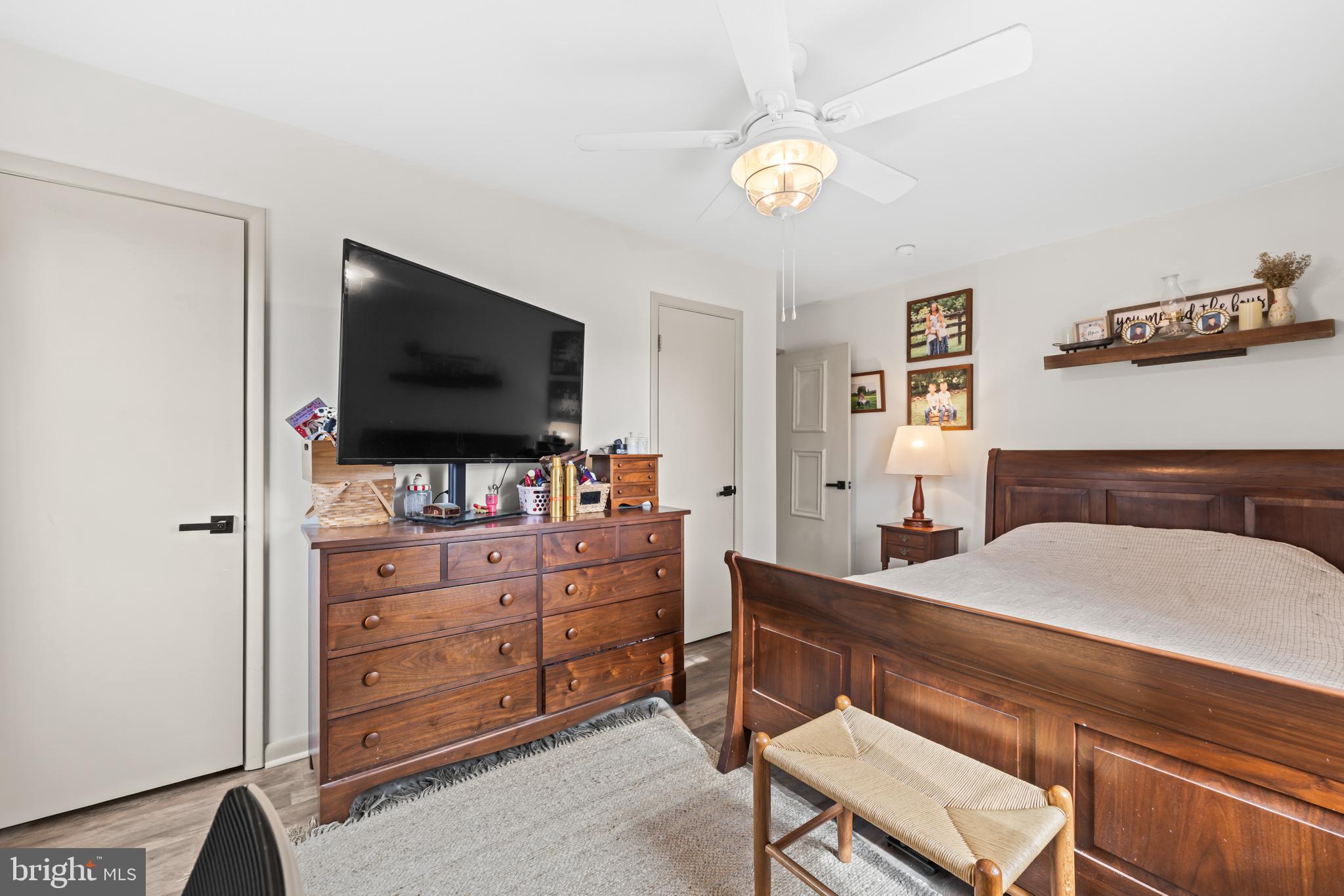 84 Clore Road Madison, VA 22727 - Photo 17 of 28 a bedroom with a bed and a flat screen tv