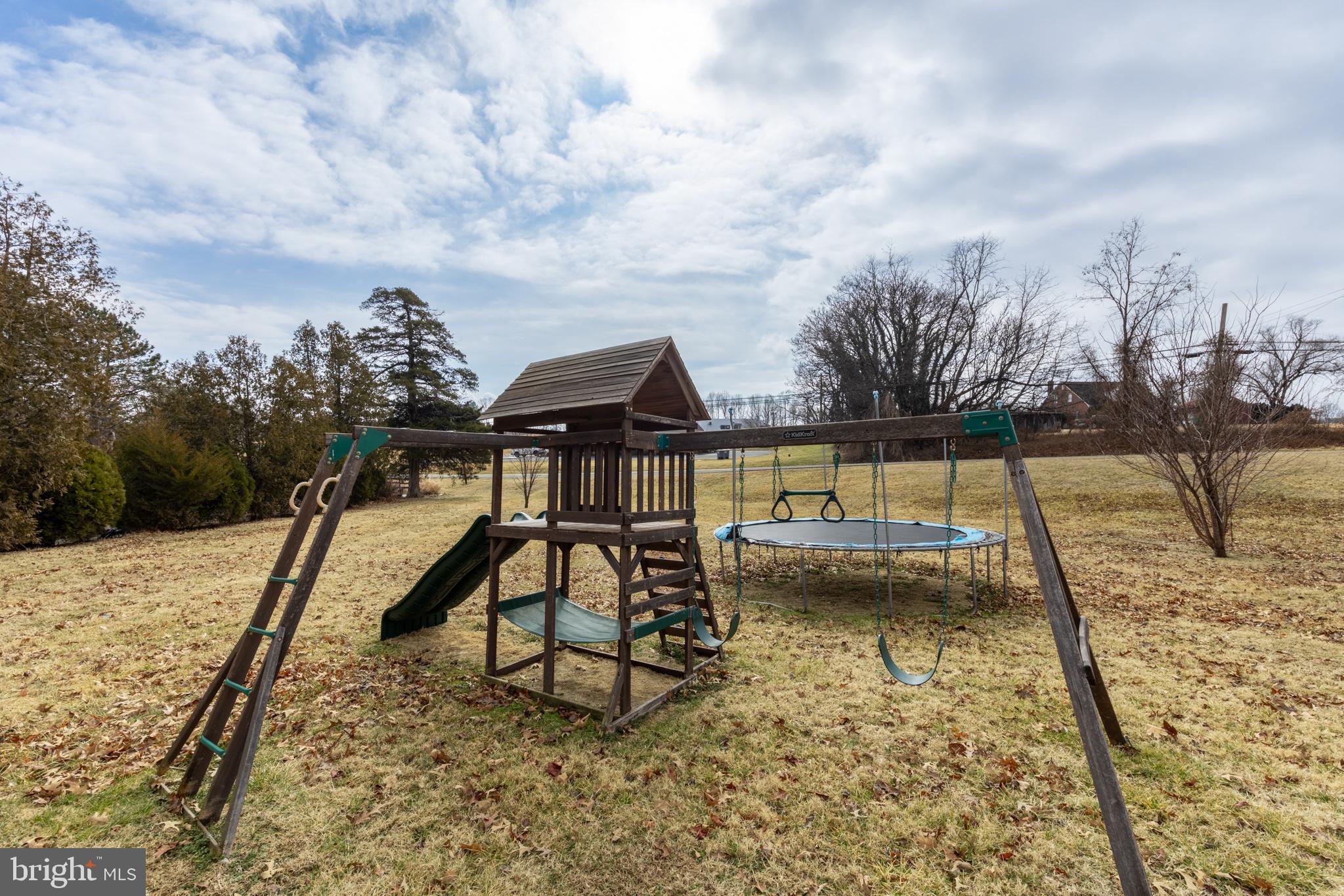 84 Clore Road Madison, VA 22727 - Photo 23 of 28 a view of a swimming pool with a lounge chair