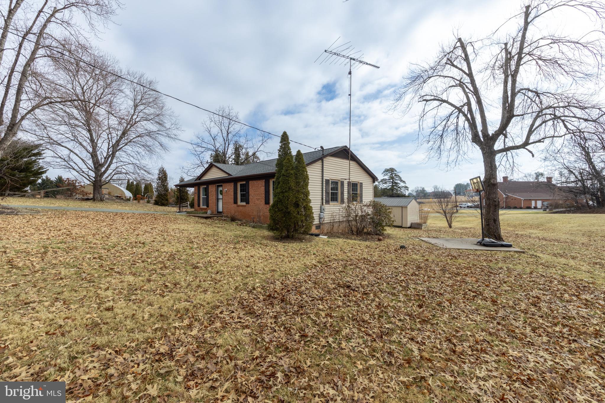84 Clore Road Madison, VA 22727 - Photo 26 of 28 a front view of a house with a yard