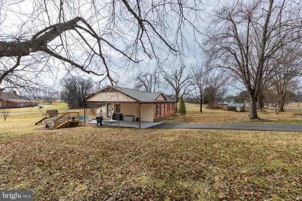 a house with trees in front of it