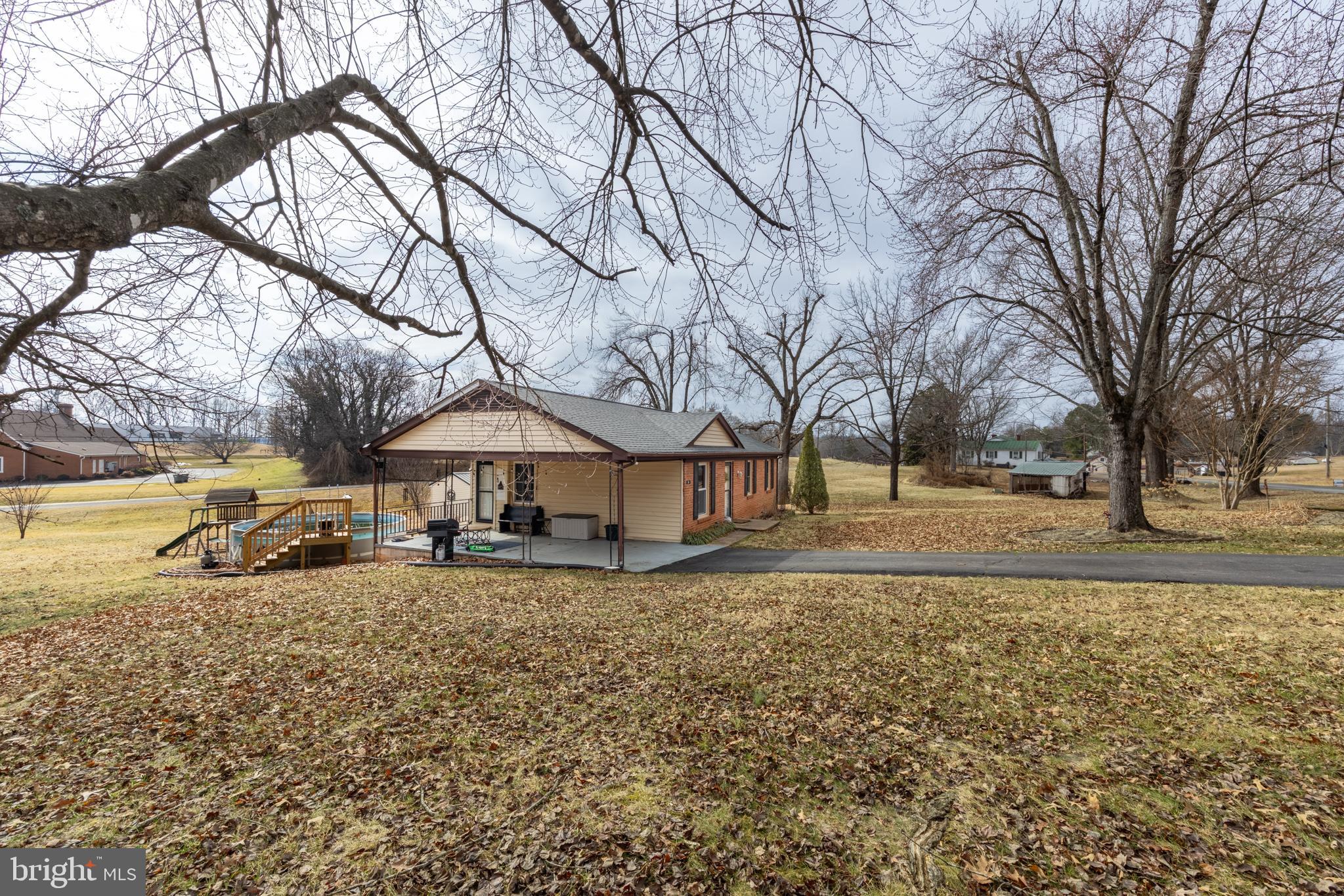 84 Clore Road Madison, VA 22727 - Photo 27 of 28 a house with trees in front of it