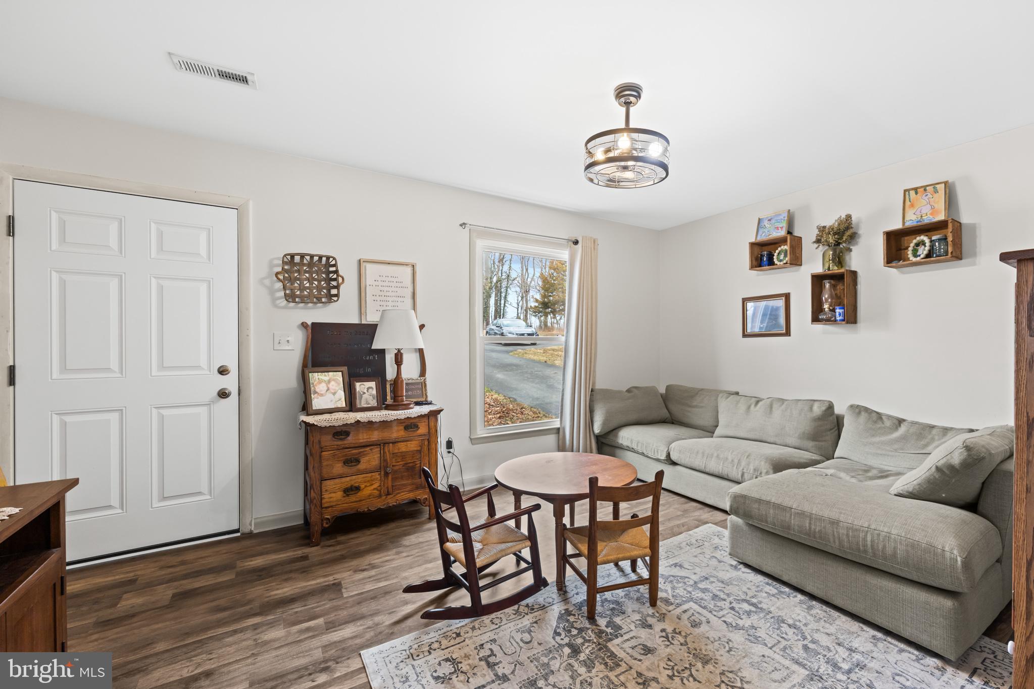 84 Clore Road Madison, VA 22727 - Photo 5 of 28 a living room with furniture and wooden floor