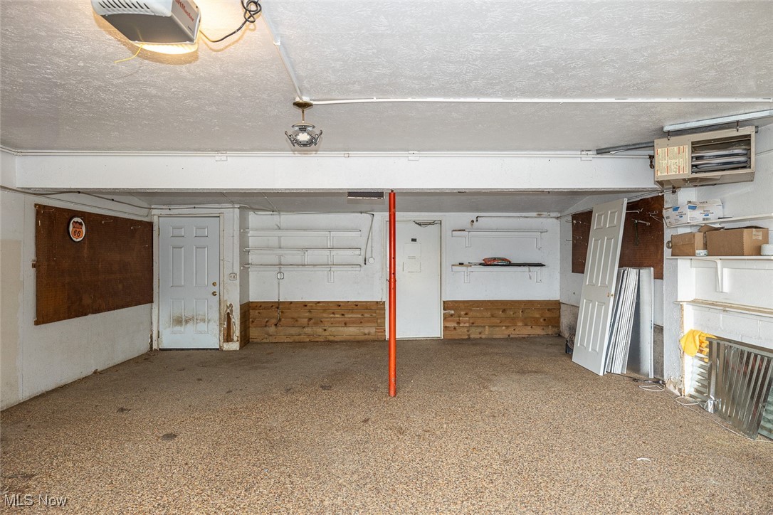 5700 Brookside Road Independence, OH 44131 - Photo 40 of 42 Nature Stone garage floor, extra deep and wide with access to the backyard and greenhouse.