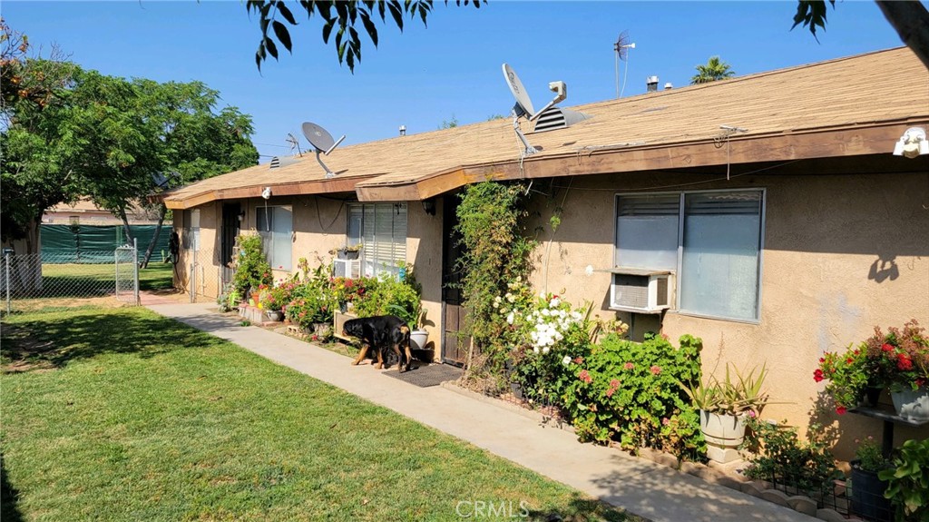 2811 13th Street Riverside, CA 92507 - Photo 1 of 1 a front view of a house with garden