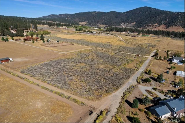 a view of an ocean and a mountain