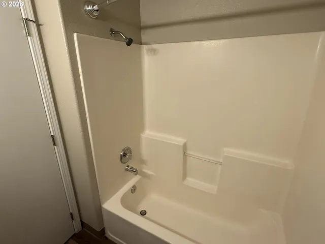 a bathroom with a bathtub