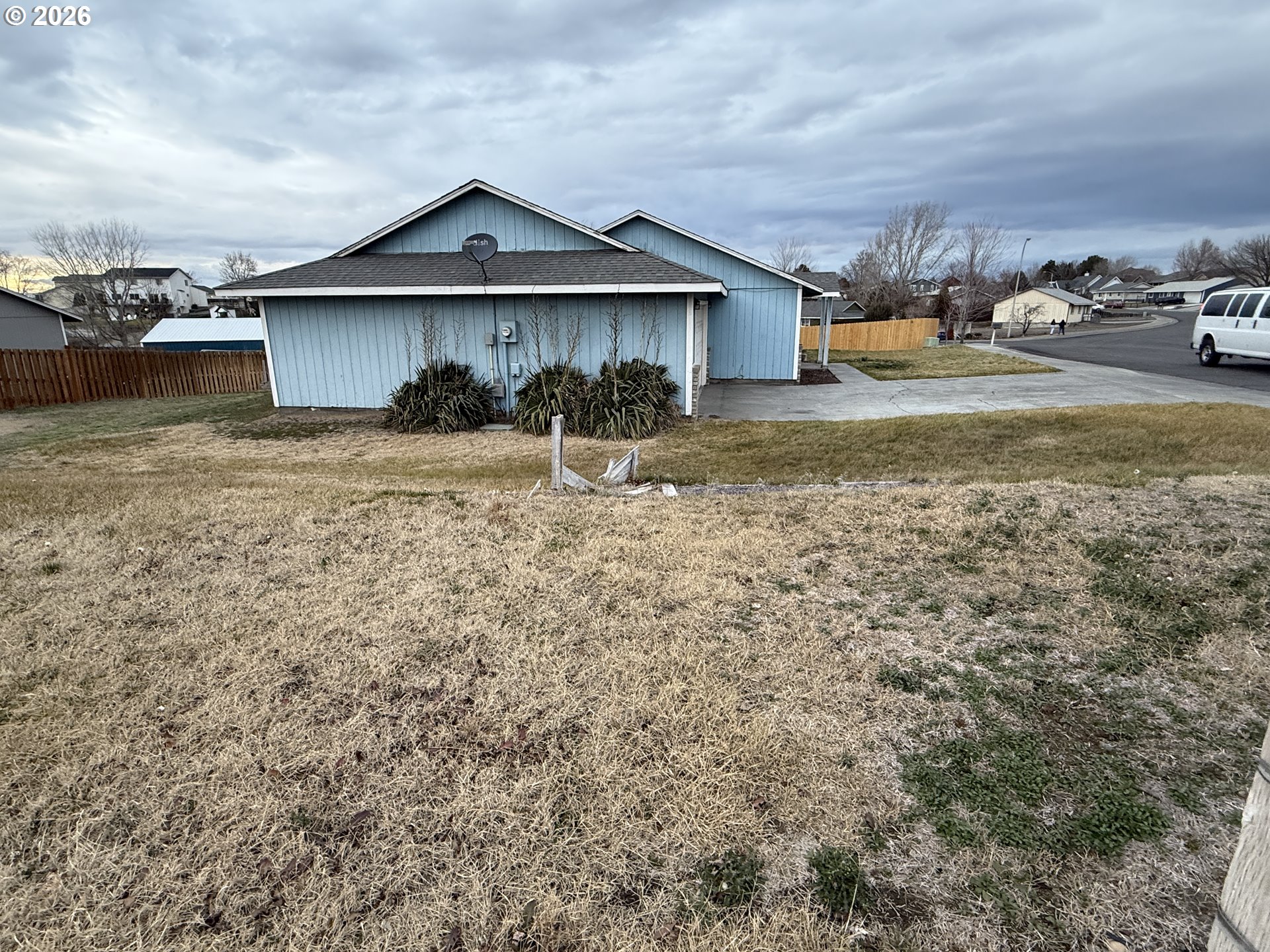 70 Northeast Alora Drive Hermiston, OR 97838 - Photo 2 of 14 a view of a house with a yard and chair