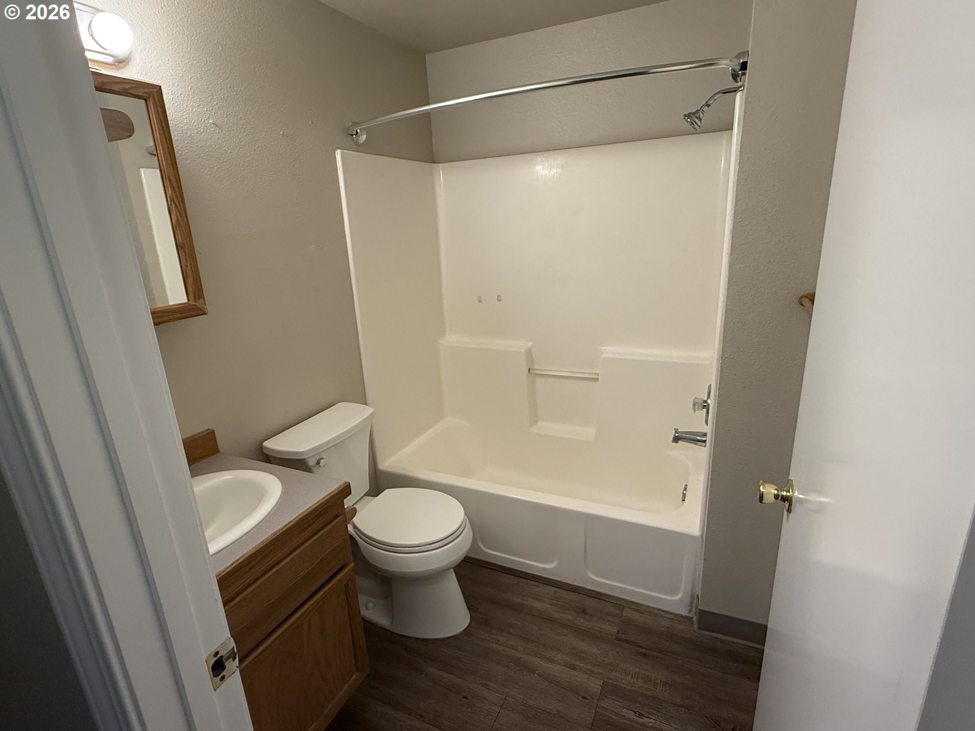 70 Northeast Alora Drive Hermiston, OR 97838 - Photo 9 of 14 a bathroom with a shower a toilet and a sink