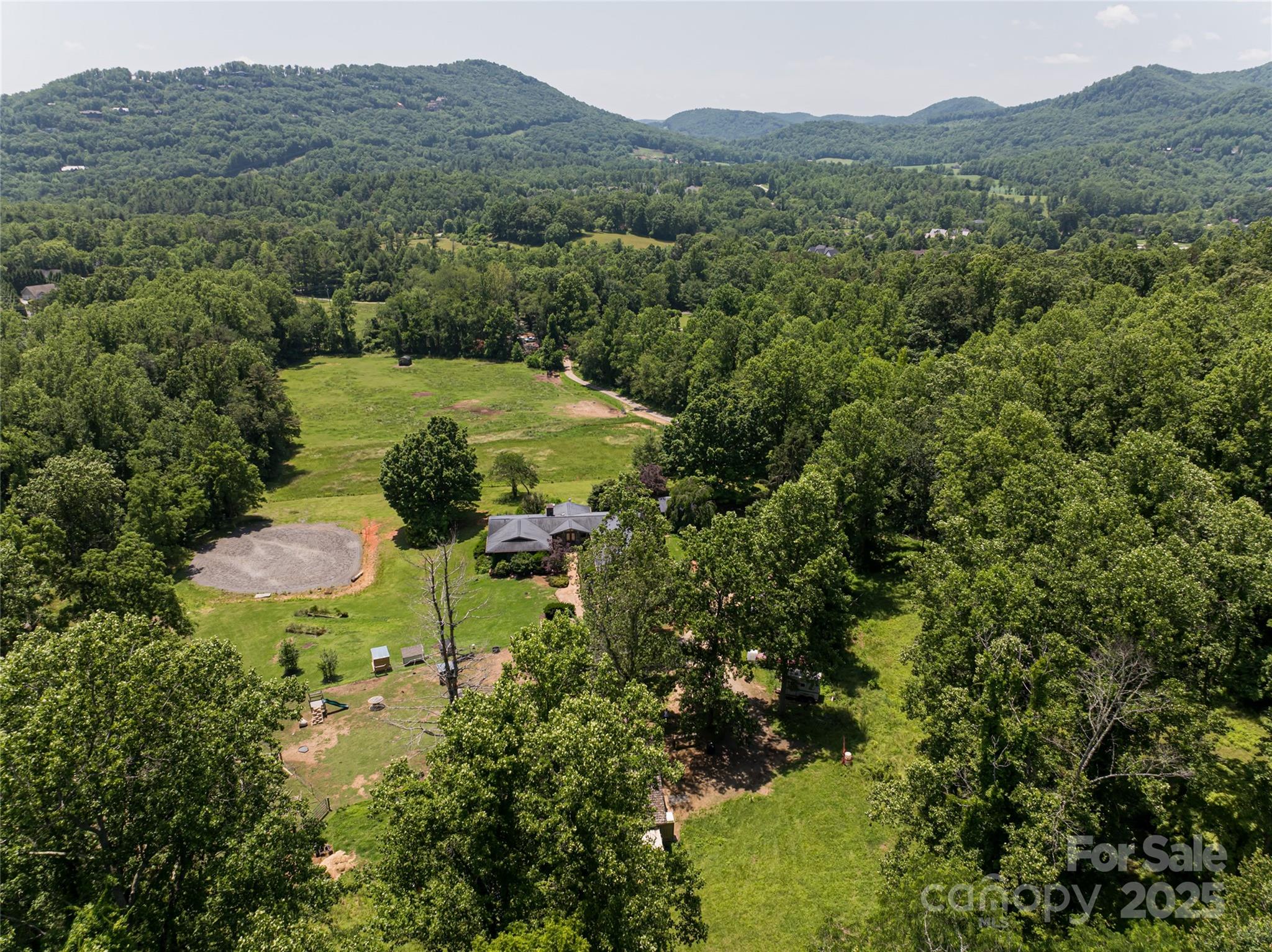 173 Avery Creek Road Arden, NC 28704 - Photo 28 of 35 a view of a lake with a mountain