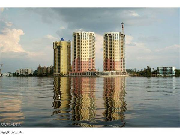 a view of a lake with a large bridge
