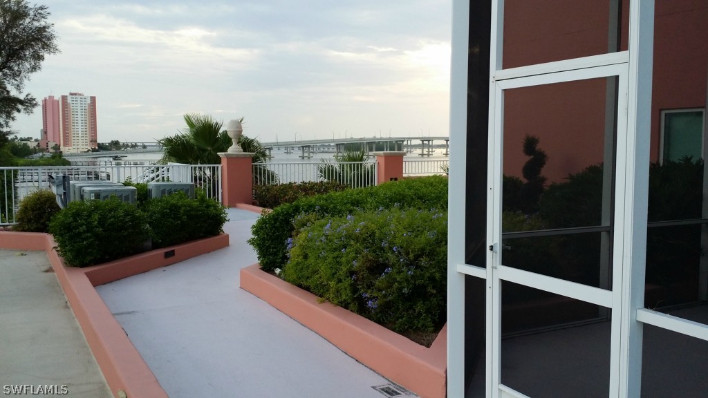 2743 First Street, Unit 305 Fort Myers, FL 33916 - Photo 16 of 21 a view of a balcony with an outdoor space