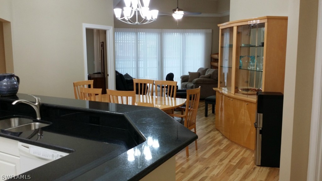 2743 First Street, Unit 305 Fort Myers, FL 33916 - Photo 3 of 21 a living room with large window and furniture