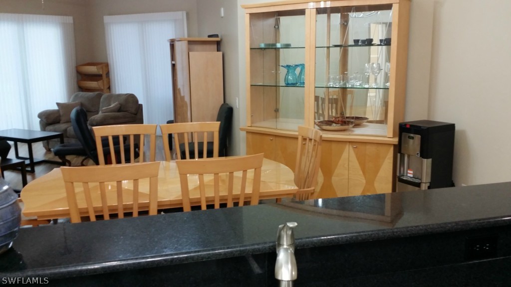 2743 First Street, Unit 305 Fort Myers, FL 33916 - Photo 4 of 21 a view of a dining room with furniture window