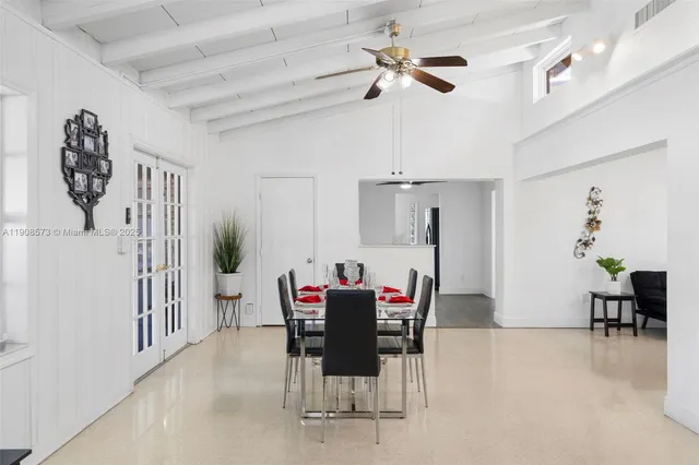 a view of a dining room with furniture