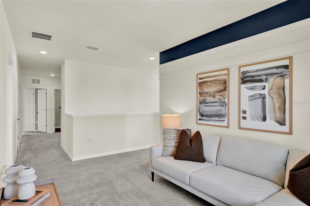 5259 Nickerbean Street Apopka, FL 32712 - Photo 18 of 33 a living room with furniture and a window