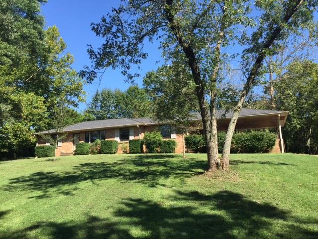 1226 Center Point Road Hendersonville, TN 37075 - Photo 1 of 14 a front view of house with yard and green space