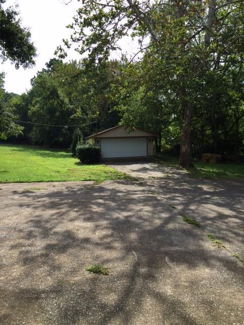 1226 Center Point Road Hendersonville, TN 37075 - Photo 4 of 14 a view of outdoor space with deck and trees
