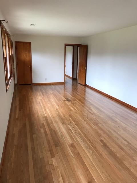 1226 Center Point Road Hendersonville, TN 37075 - Photo 7 of 14 wooden floor in an empty room with a window