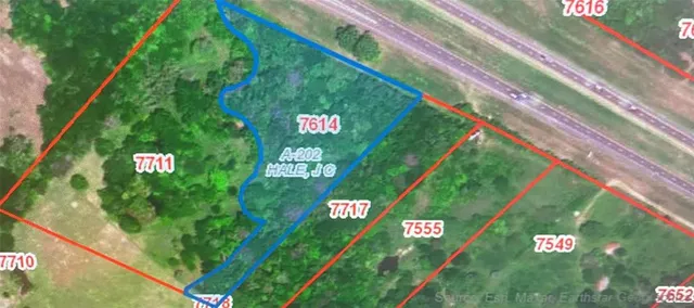 a view of swimming pool with outdoor seating