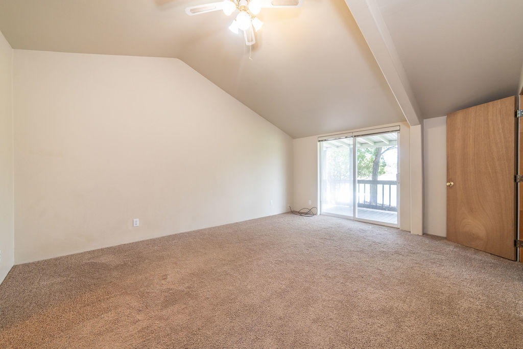 61395 Ward Road Bend, OR 97702 - Photo 21 of 56 a view of an empty room with a window
