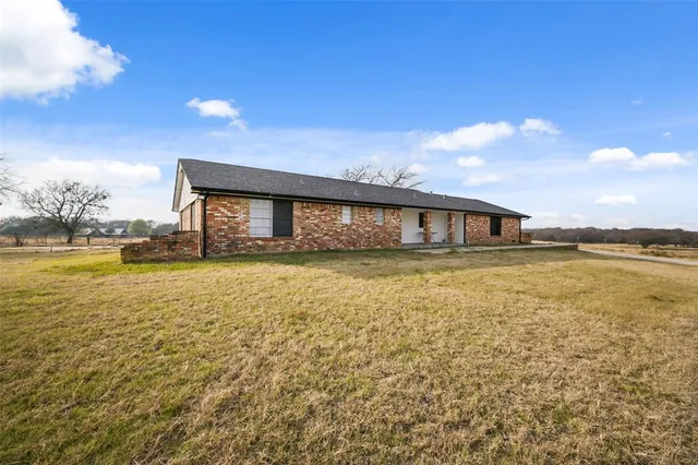 a large body of water with a view of building