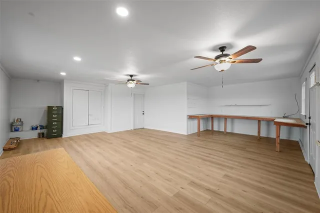 a view of a livingroom with a workspace