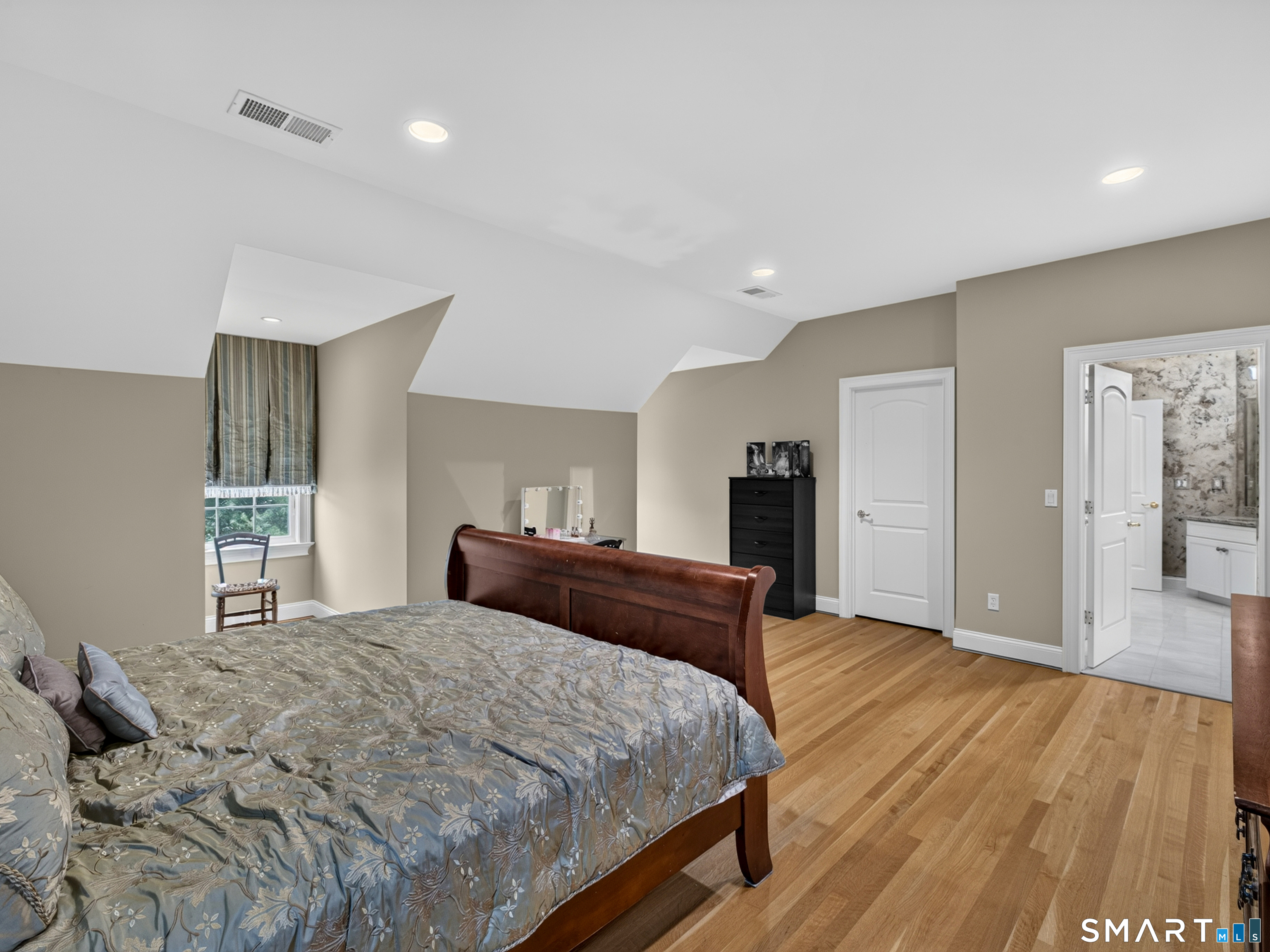 55 Hunters Ridge Rocky Hill, CT 06067 - Photo 25 of 40 a bedroom with a bed and wooden floor