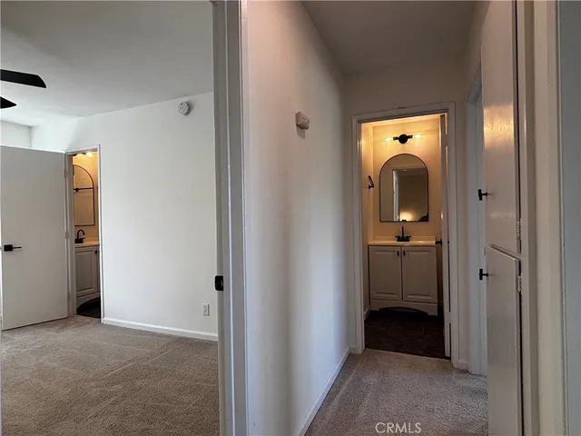 a view of a bathroom from a bedroom