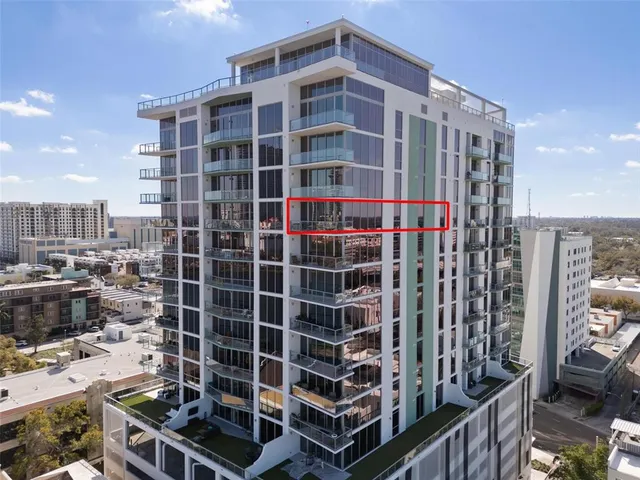 a view of a city with tall buildings