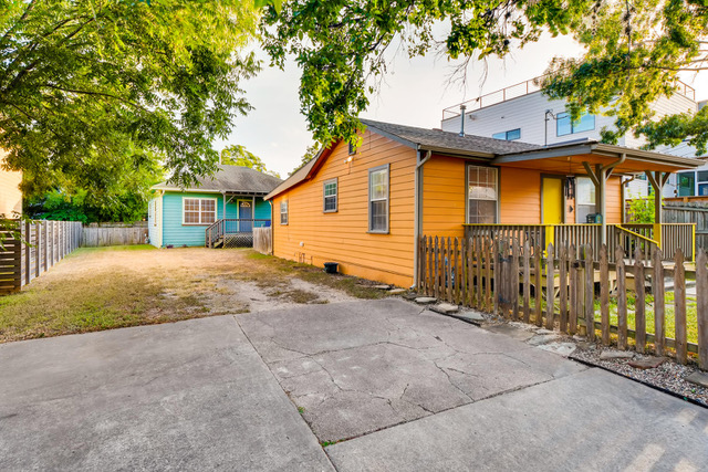 a front view of a house with a garage